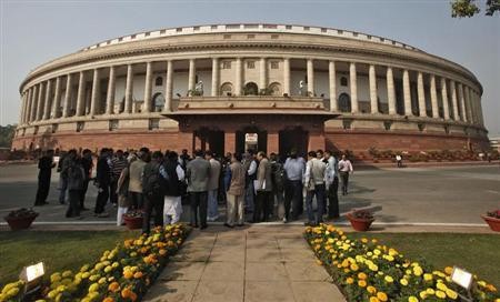 People stand in front of the Indian parliament building (representational picture)